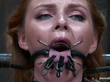 lady in bondage gets her tits clamped